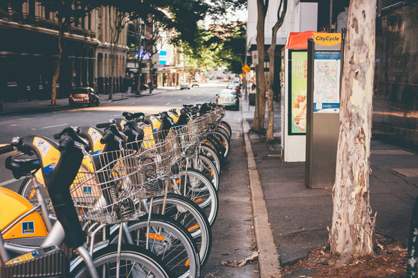 Bikes parked on a street as part of a public bike sharing scheme