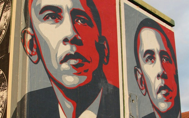 Cropped photograph of two posters of Barack Obama